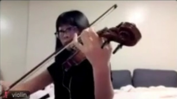 Photo of musician from a Zoom cast.