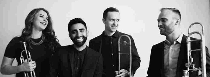 Black and white photo of a musical group.