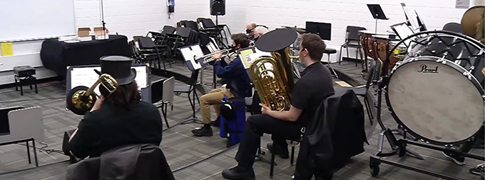 Image of a band performing together.